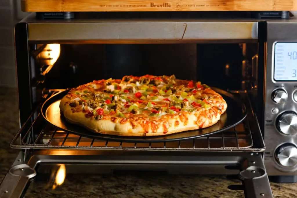 bake pizza in the oven - How do you cook pizza in a regular oven